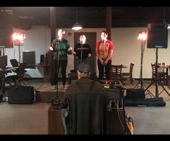 Karaoke in the Livdahl Lounge of Frontier Hall.